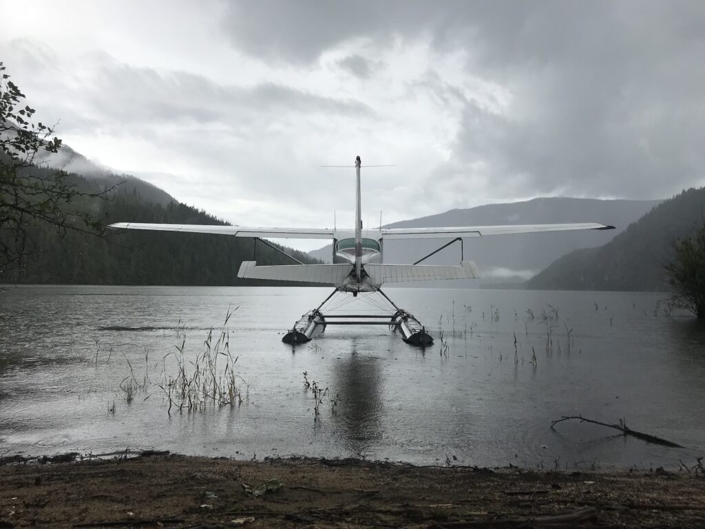 floatplane on a lake on a cloudy day